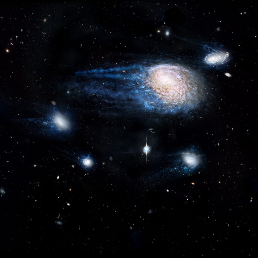 An artist’s impression showing the increasing effect of ram-pressure stripping in removing gas from galaxies, sending them to an early death. Credit: ICRAR, NASA, ESA, the Hubble Heritage Team (STScI/AURA)