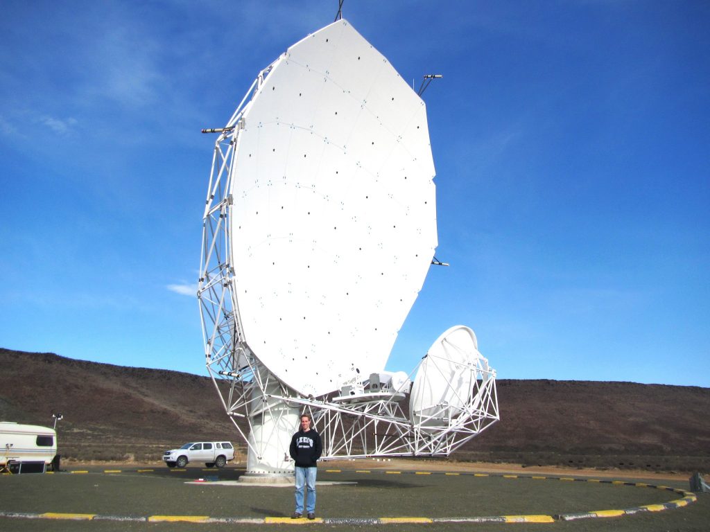  DAVID GOZZARD AND A MEERKAT DISH AT THE SKA SITE IN SOUTH AFRICA.