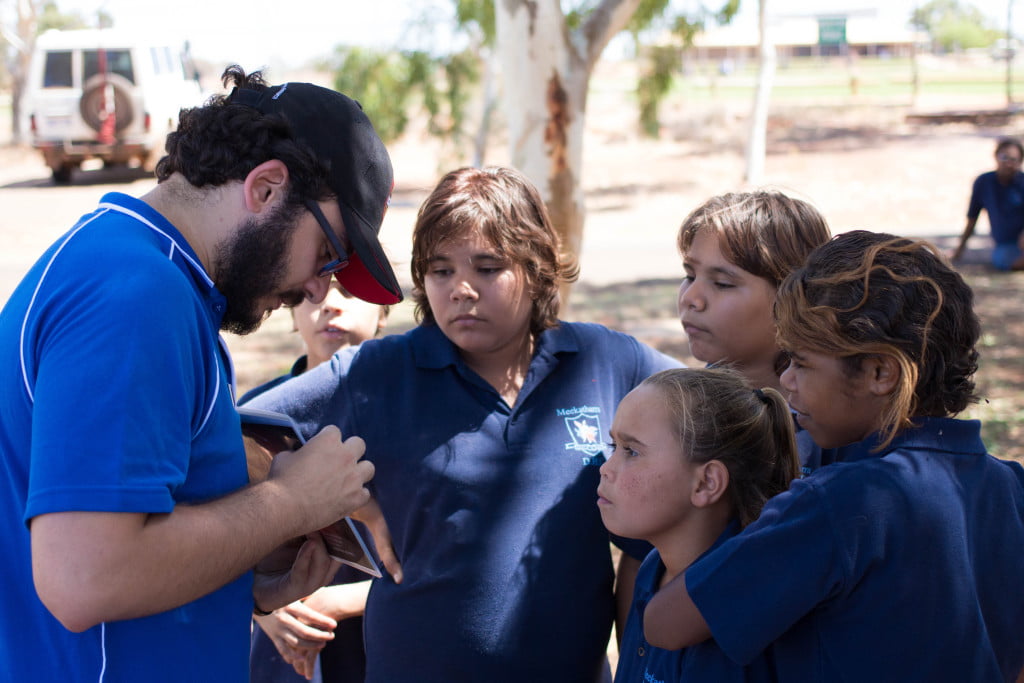 ICRAR PhD Candidate Mehmet Alpaslan discussing Jupiter with students from Meekatharra DHS.
