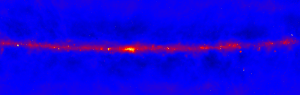 A radio telescope image of the Milky Way galaxy showing the bright red radio emission from the plane of our galaxy and a dark blue sky surrounding it. 