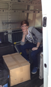 Benjamin Stone taking a break in the middle of helping unload ICRAR equipment during his work experience.