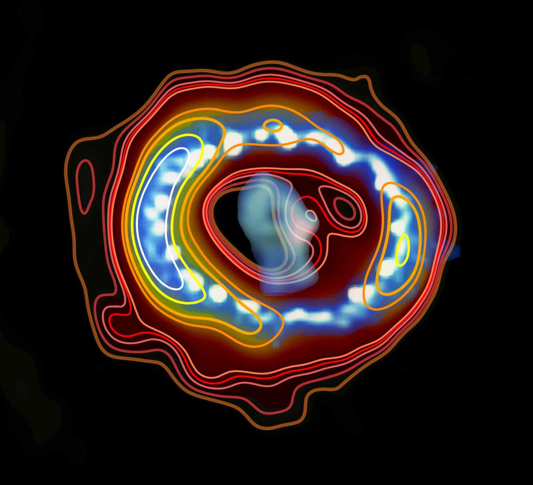 Radio (contours) (Credit: ICRAR) + Hubble (image overlay) Overlay of the 7-mm radio image observed with the ATCA (brown–yellow colour scale for shades and contours) on the Hubble Space telescope image observed during the same period. (blue–white colour scale).