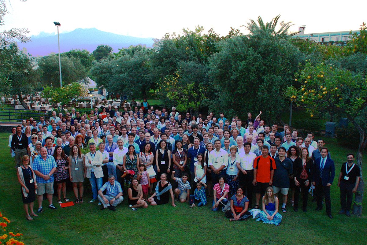 Official photo of the Advancing Astrophysics with the SKA conference held in Giardini Naxos June 8-13 in the gardens of the Atahotel Naxos Beach, with Mount Etna in the background. Credit: SKA Office.