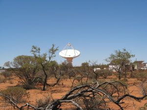 Image: The first ASKAP antenna, now erected in Western Australia. Credit: Dave DeBoer, CSIRO.