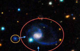 THE MILKY WAY NOW HAS A TWIN (OR TWO)