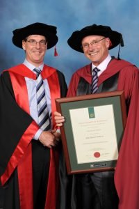 Dr John O'Sullivan (right) and Professor Peter Hall at the ceremony in September. Credit: Image provided by Curtin University