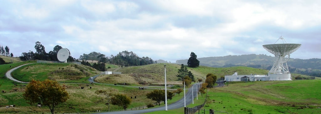 Nestled among the green hills of Warkworth, AUT and Telecom NZ are working together to build one of the largest and most advanced research facilities in the country. Photo shows 12-m Patriot antenna (left) and the 30-m dish (right). Credit: Sergei Gulyaev and anzSKA.