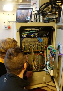 David Gozzard and Sascha Schediwy inspecting the modifications to the Compact Array receivers. Credit Jock McFee.