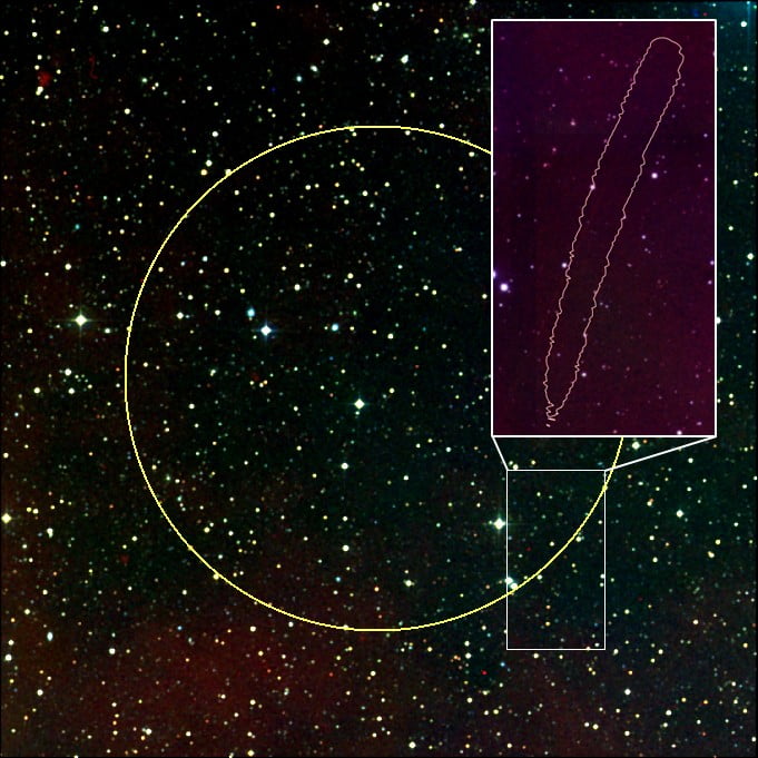 The yellow circle shows the typical location of an FRB. There are thousands of stars and galaxies in this direction. Because the burst was very bright we were able to locate it to a small region near the edge of that circle, shown as the pink banana-shaped region in the inset. In this region there are only 6 detected galaxies. The position of the most likely host galaxy, VHS7, is highlighted on the plot. Credit: Dr Vikram Ravi/Caltech and Dr Ryan Shannon/ICRAR-Curtin/CSIRO