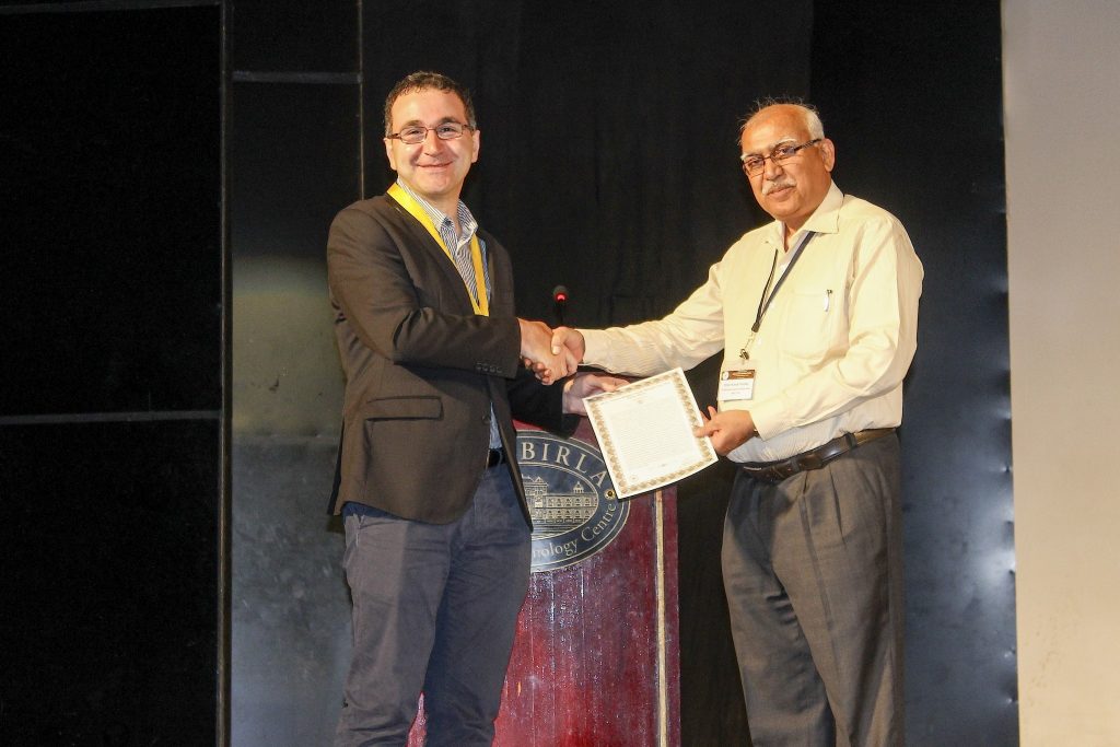 Dr Luca Cortese receiving the Bappu Gold medal at a ceremony in Jaipur (india) on March 7 as part of the annual meeting of the Astronomical Society of India (ASI).