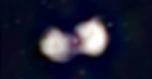 Fornax A, as seen in radio “colours” via the GLEAM survey; red = 72 — 103 MHz; green = 103 — 134 MHz; blue= 139 — 170MHz; the lobes have a different spectral behaviour to the central core.
