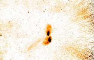 Telescopes team up to study giant galaxy