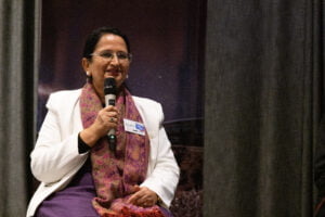 Dr Renu Sharma presenting at ICRARCon in 2023
