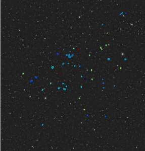 The 49ers - the 49 new gas-rich galaxies detected by the MeerKAT radio telescope in South Africa. Each detection is shown as coloured contours, with redder colours indicating more distant gas from us, and bluer colours as closer gas. The background image comes from the optical PanSTARRS survey.