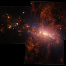 A giant galactic explosion catches galaxy pollution in the act Image
