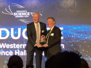 Professor Quinn accepts his induction into the WA Science Hall of Fame from WA state Science Minister Stephen Dawson.