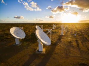 CSIRO’s ASKAP radio telescope lit by bright sunlight.