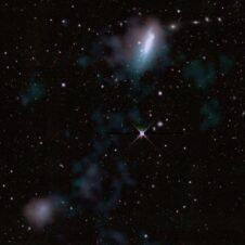 Dwarf galaxies linked by massive intergalactic gas bridge