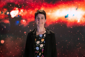 Professor Natasha Hurley-Walker with GLEAM-X in the background